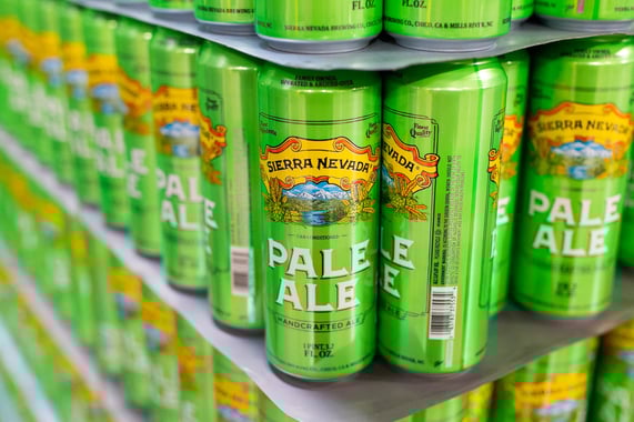 A palate of tall boy cans of Sierra Nevada Pale Ale